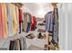 Walk-in closet with metal shelving and hanging racks for storage at 3400 Dencrest Se Ct, Smyrna, GA 30080