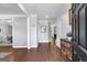 Elegant entryway with hardwood floors, crown molding, and a view into the dining room at 3400 Dencrest Se Ct, Smyrna, GA 30080