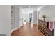 Spacious hallway with hardwood floors, built-in shelving, and elegant furnishings at 3400 Dencrest Se Ct, Smyrna, GA 30080