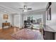 Bright home office featuring hardwood floors, large windows, and classic trim, perfect for remote work at 3400 Dencrest Se Ct, Smyrna, GA 30080