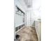 Bathroom includes a closet system and a double sink vanity with marble countertop at 150 Sandy Ridge Trl, Fayetteville, GA 30214