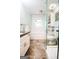 Bright bathroom featuring tub with tile surround and glass door walk-in shower at 150 Sandy Ridge Trl, Fayetteville, GA 30214