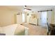 Spacious bedroom with a walk-in closet, neutral colors, and ample natural light at 150 Sandy Ridge Trl, Fayetteville, GA 30214