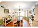 Charming dining room with hardwood floors, a bay window, and lovely cabinetry at 150 Sandy Ridge Trl, Fayetteville, GA 30214
