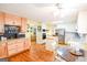 Open concept kitchen with eat-in breakfast nook and stainless steel appliances at 150 Sandy Ridge Trl, Fayetteville, GA 30214