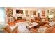 Cozy living room with fireplace, built-in shelving, and comfortable seating arrangement at 150 Sandy Ridge Trl, Fayetteville, GA 30214