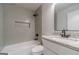 Updated bathroom with tiled shower and granite countertop sink at 3404 Broxton Mill Way, Snellville, GA 30039