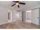 Spacious bedroom with light wood floors and multiple doorways and closet access at 3404 Broxton Mill Way, Snellville, GA 30039