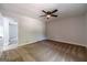 Bedroom with neutral carpeting, ceiling fan, and access to closet at 3404 Broxton Mill Way, Snellville, GA 30039
