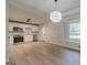 A view of a modern kitchen with stainless steel appliances and hardwood floors at 3404 Broxton Mill Way, Snellville, GA 30039