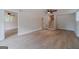 Open living room with wood-look floors and staircase to upper level at 3404 Broxton Mill Way, Snellville, GA 30039