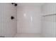 Shower features updated tile and shower head at 3404 Broxton Mill Way, Snellville, GA 30039