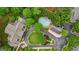 An overhead shot of the property displaying an amazing pool and beautiful landscape design around the home at 1858 Preserve Way, Atlanta, GA 30341
