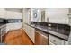 Spacious kitchen with stainless steel appliances, granite counters, and ample cabinet space at 1858 Preserve Way, Atlanta, GA 30341