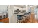 Open kitchen with a breakfast bar, stainless steel appliances, and plenty of counter seating at 1858 Preserve Way, Atlanta, GA 30341