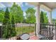 Outdoor patio with seating and views of the lush landscape, creating a peaceful and relaxing outdoor living area at 1858 Preserve Way, Atlanta, GA 30341