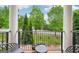 Outdoor patio with seating and views of the lush landscape, creating a peaceful and relaxing outdoor living area at 1858 Preserve Way, Atlanta, GA 30341