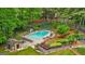 Community pool area featuring lounge chairs and landscaped surroundings for residents at 1858 Preserve Way, Atlanta, GA 30341