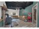 Finished basement with wood burning stove, light wood floors, comfortable living space, and fun popcorn machine at 6290 Cascade Palmetto Hwy, Fairburn, GA 30213
