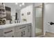 Modern bathroom showcasing a gray vanity, walk-in shower, and stylish fixtures at 6290 Cascade Palmetto Hwy, Fairburn, GA 30213
