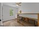 Bright bedroom with a wooden bunk bed, ample natural light, and neutral decor at 6290 Cascade Palmetto Hwy, Fairburn, GA 30213