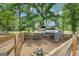 Fenced-in backyard area with a chicken coop at 6290 Cascade Palmetto Hwy, Fairburn, GA 30213