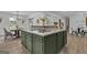 Spacious kitchen island with a gas cooktop, cabinets, and sleek countertops perfect for cooking at 6290 Cascade Palmetto Hwy, Fairburn, GA 30213