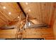Loft space with two beds, wood-paneled ceiling, and access ladder at 6290 Cascade Palmetto Hwy, Fairburn, GA 30213