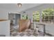 Bright mud room area with access to the laundry room and backyard at 6290 Cascade Palmetto Hwy, Fairburn, GA 30213
