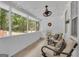 Relaxing screened porch with comfortable seating and views of the lush backyard, perfect for outdoor living at 6290 Cascade Palmetto Hwy, Fairburn, GA 30213