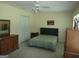 Serene bedroom with a queen bed, ample dresser storage, and a calming color palette at 920 Courthouse Rd, Temple, GA 30179