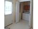 Convenient laundry room with washer, dryer, and additional storage space at 920 Courthouse Rd, Temple, GA 30179