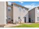 Backyard showing the house with the patio area, vinyl siding, and the air conditioner at 2268 Nicole Dr, Hampton, GA 30228