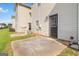 Exterior view of the house's patio area, backyard, vinyl siding, and exterior door at 2268 Nicole Dr, Hampton, GA 30228