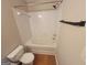 This bathroom has a bath/shower combo with tile and neutral paint at 2268 Nicole Dr, Hampton, GA 30228