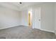 Spacious bedroom featuring neutral walls, gray carpet, and ceiling fan at 2268 Nicole Dr, Hampton, GA 30228