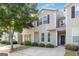 Attractive townhome exterior with inviting front entrance, manicured landscaping, and a welcoming curb appeal at 2268 Nicole Dr, Hampton, GA 30228