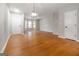 Spacious living room with natural light, hardwood floors, and a neutral color palette at 2268 Nicole Dr, Hampton, GA 30228