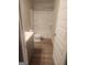 Bright bathroom featuring a tub/shower combination and a gray vanity at 1049 Homer Ln, Stockbridge, GA 30281