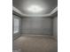 Bedroom with large paneled wall and window at 1049 Homer Ln, Stockbridge, GA 30281
