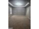 Large bonus room featuring custom wall design and neutral carpeting at 1049 Homer Ln, Stockbridge, GA 30281
