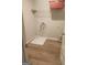 Neutral laundry room features modern flooring and laundry hookups at 1049 Homer Ln, Stockbridge, GA 30281