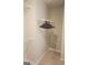 Walk-in closet featuring carpeted flooring and rod for hanging clothes at 1049 Homer Ln, Stockbridge, GA 30281