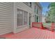 Back of home features a wood-stained deck with views to the yard, and a light-colored exterior at 165 Hidden Lake Dr, Fayetteville, GA 30215