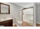 Bathroom featuring modern shower, vanity, and fixtures at 165 Hidden Lake Dr, Fayetteville, GA 30215