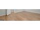 Bedroom with hardwood floors and an open doorway at 165 Hidden Lake Dr, Fayetteville, GA 30215