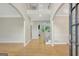 Bright foyer with hardwood floors, arched doorways, and staircase at 165 Hidden Lake Dr, Fayetteville, GA 30215