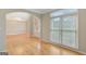 Hardwood floors and natural light fill the living room at 165 Hidden Lake Dr, Fayetteville, GA 30215