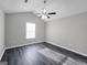 Spacious bedroom with vaulted ceiling and hardwood floors providing a calm and inviting atmosphere at 3075 Lakeside Cir, Covington, GA 30016
