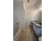 Large granite countertop vanity and tub in bathroom at 921 Winding Down Way, Grayson, GA 30017